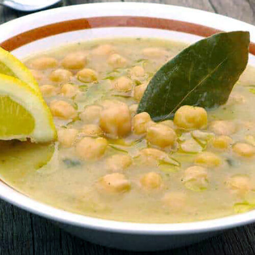 greek chickpea soup (revithia) served with lemon wedges