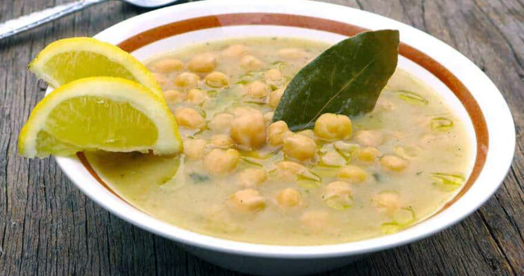 greek chickpea soup (revithia) served with lemon wedges