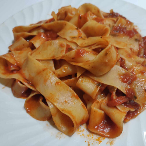 Learn how to make Pappardelle Pasta with Arrabbiata Sauce a traditional italian dish