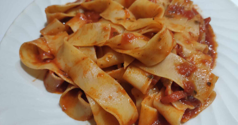 Learn how to make Pappardelle Pasta with Arrabbiata Sauce a traditional italian dish