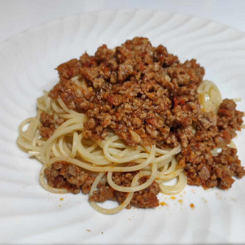 makaronia me kima is a traditional greek spaghetti with meat sauce